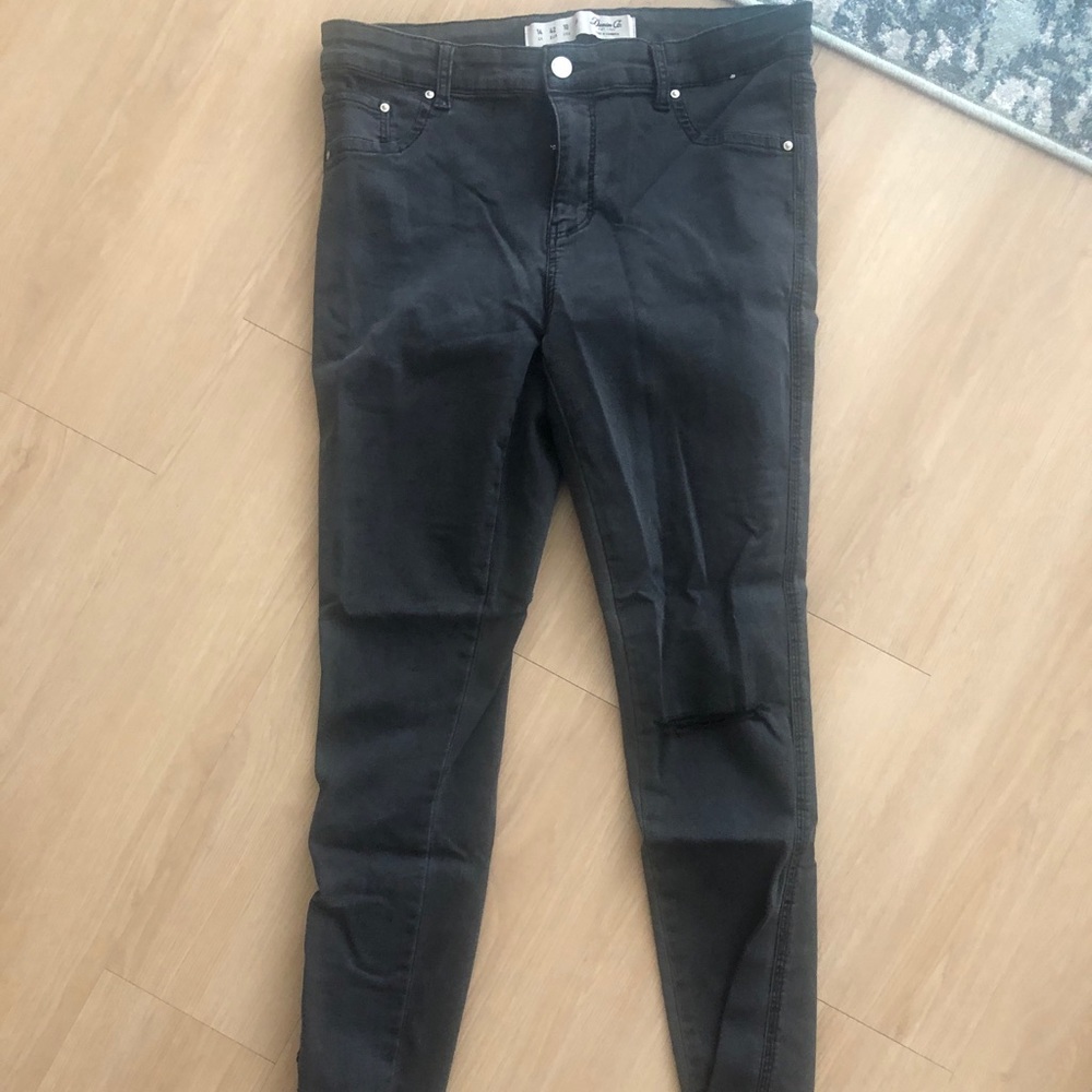 Distressed Mid Rise Black Skinny Jeans